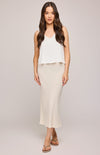Cassia Skirt in Linen by Gentle Fawn – front view of flowy neutral skirt