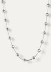 Silver Celeste Necklace by Jenny Bird, laid flat on white background, with elongated metal beads and high-polish finish.