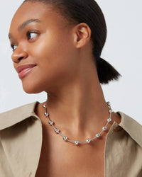 Silver Celeste Necklace by Jenny Bird worn on model, highlighting high-polish finish and elegant design for versatile styling, at Lemonberry in Aurora.