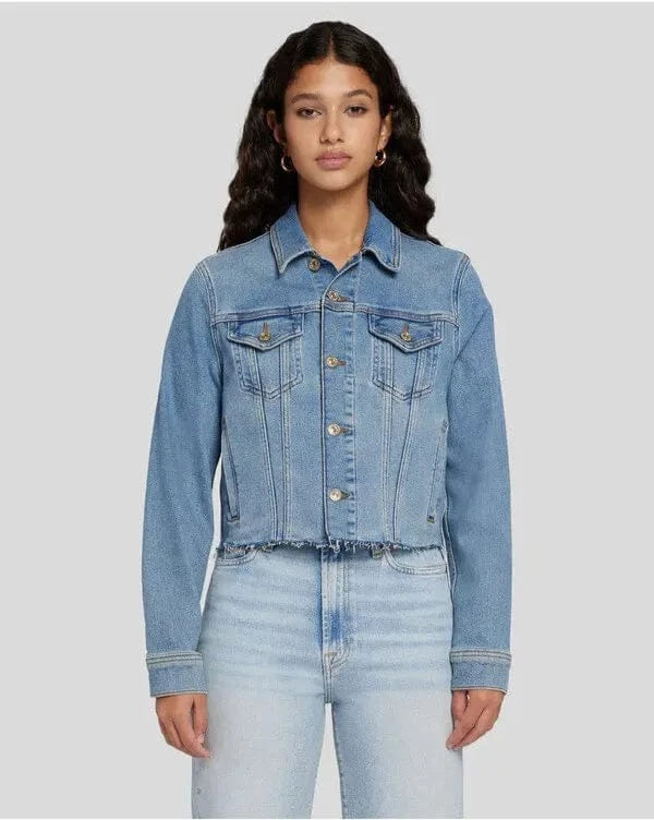 Model wearing the Signature Trucker Jacket in Luxe Vintage denim, styled with jeans for a timeless look. Available at Lemonberry in Aurora, ON, with shipping across Canada!