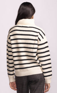 Back view of Pink Martini Corsica Sweater with horizontal black stripes.