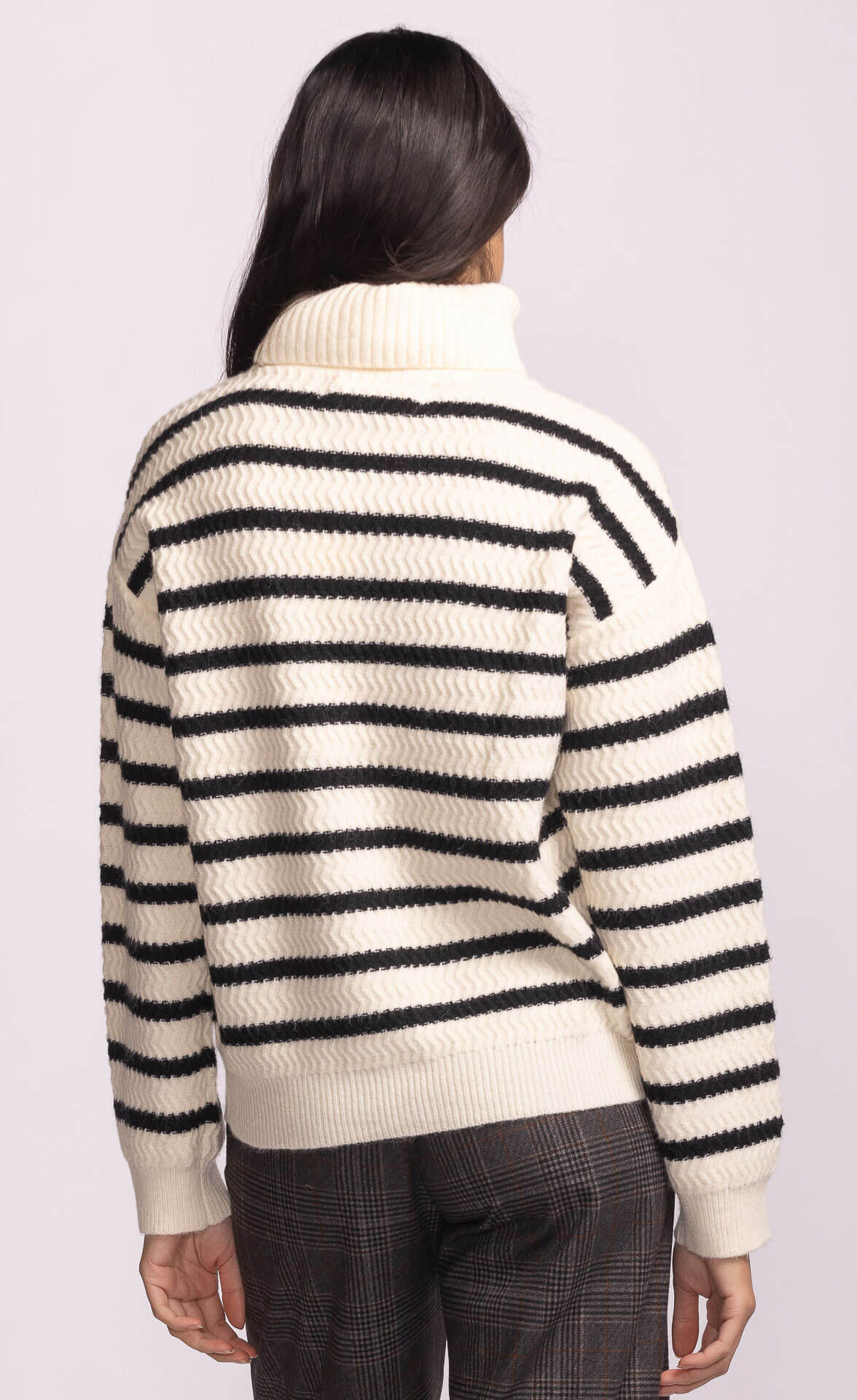 Back view of Pink Martini Corsica Sweater with horizontal black stripes.