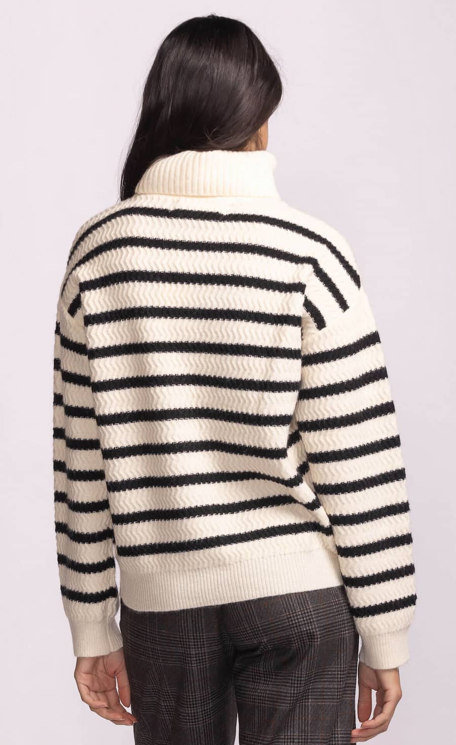 Back view of Pink Martini Corsica Sweater with horizontal black stripes.