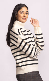 Side view of model in Pink Martini Corsica striped knit.