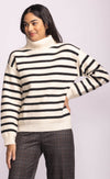Model wearing Pink Martini Corsica Sweater in cream with black stripes, front view.