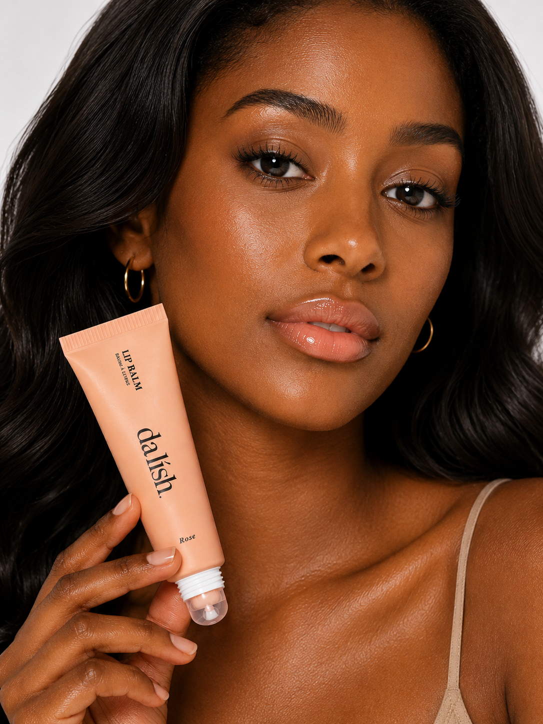 Da Lish Rose tinted lip balm on model