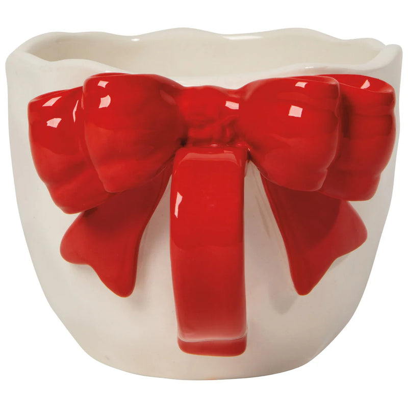 Close-up of sculpted red bow handle on Danica Bowtique Mug