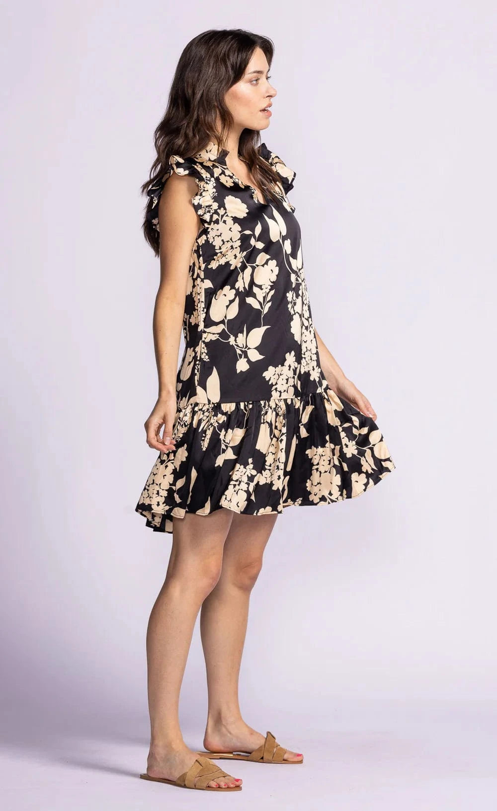 Side view of the Dina Dress by Pink Martini, a perfect lightweight dress to wear out with friends on a warm spring afternoon.