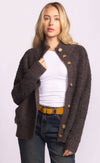 Dolly Sweater styled open over white top with jeans.