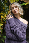 Close-up of Dusted Plum Sailing Sweater showing waffle knit texture and rib trim.