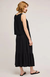 Back view of the Elaine Skirt by Gentle Fawn, paired with a black tanks and black flip flops, available at Lemonberry in Aurora, ontario.