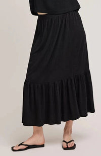 Front view of the  Elaine Skirt by Gentle Fawn, paired with black flip flops. Available at Lemonberry, a few minutes south of Bradford.