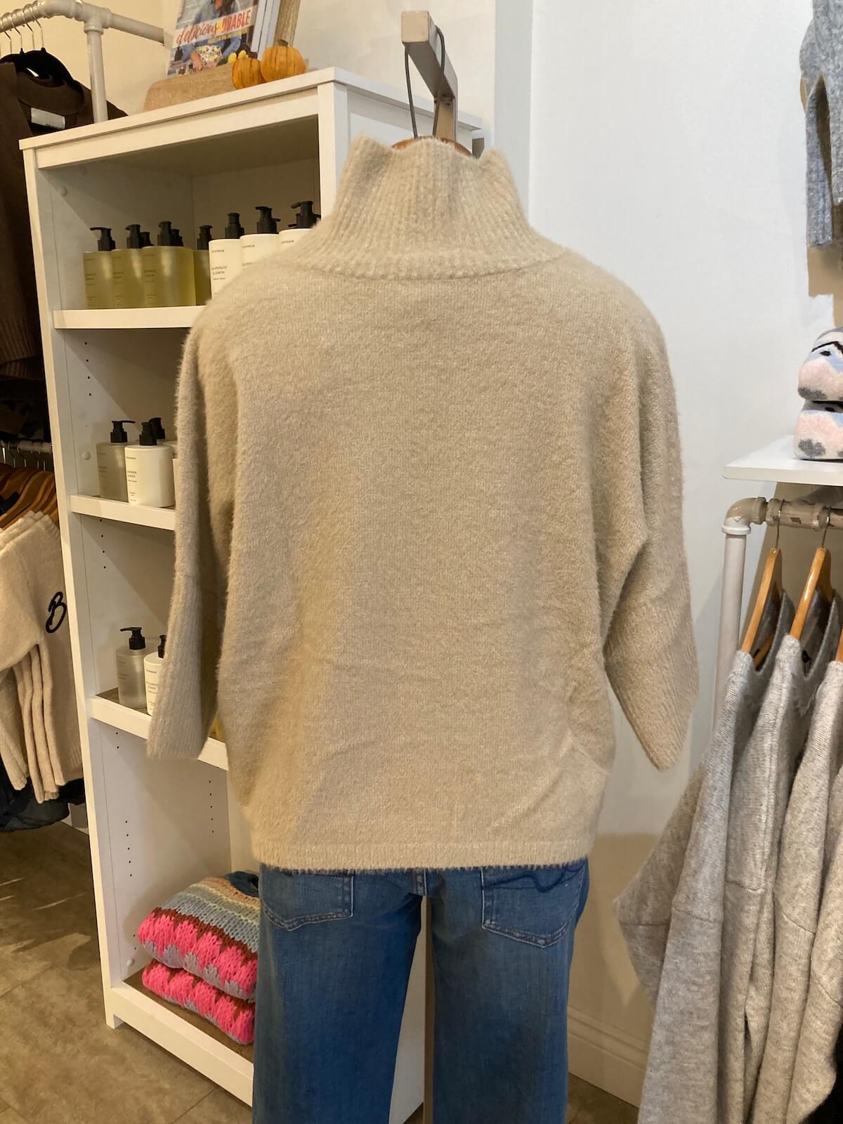 Ella Sweater by Melissa Nepton displayed in-store at Lemonberry, back view on mannequin.