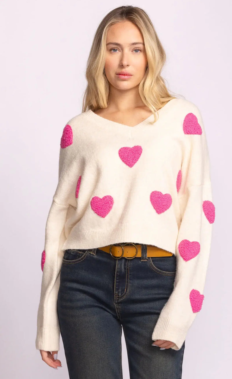 Espera Sweater by Pink Martini in white with pink heart appliqués, V-neck knit – available at Lemonberry Aurora