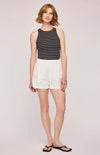 Another front view of the Eton Tank by Gentle Fawn, paired with white shorts and flip flips.