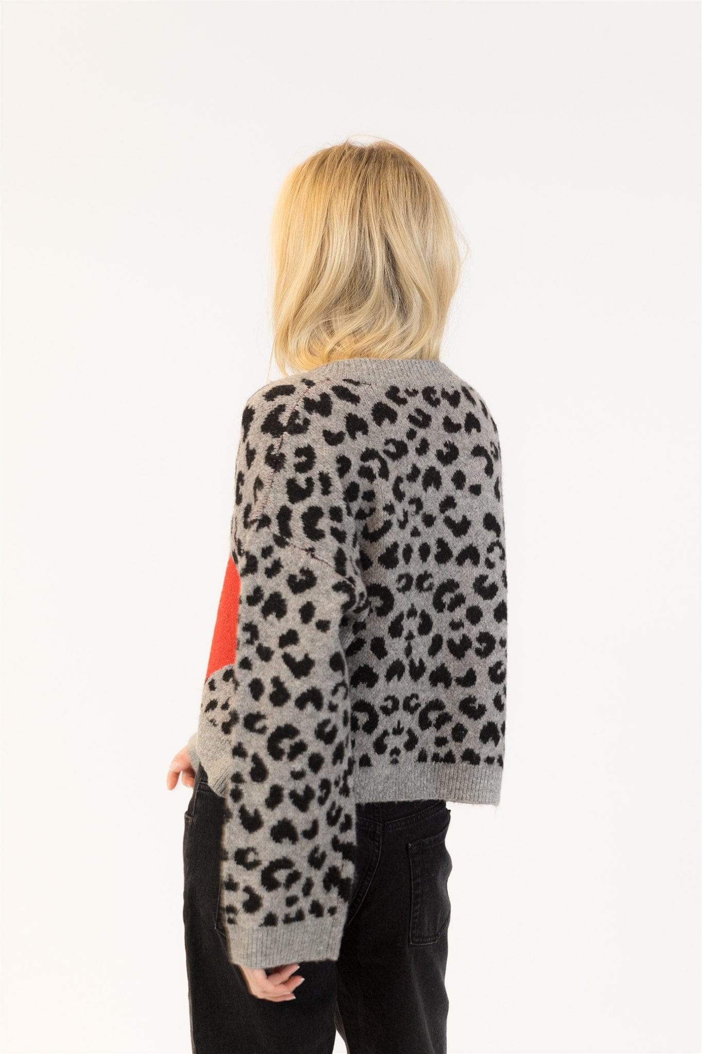Back view of cardigan with heart detail on sleeve, available at Lemonberry in Aurora Ontario