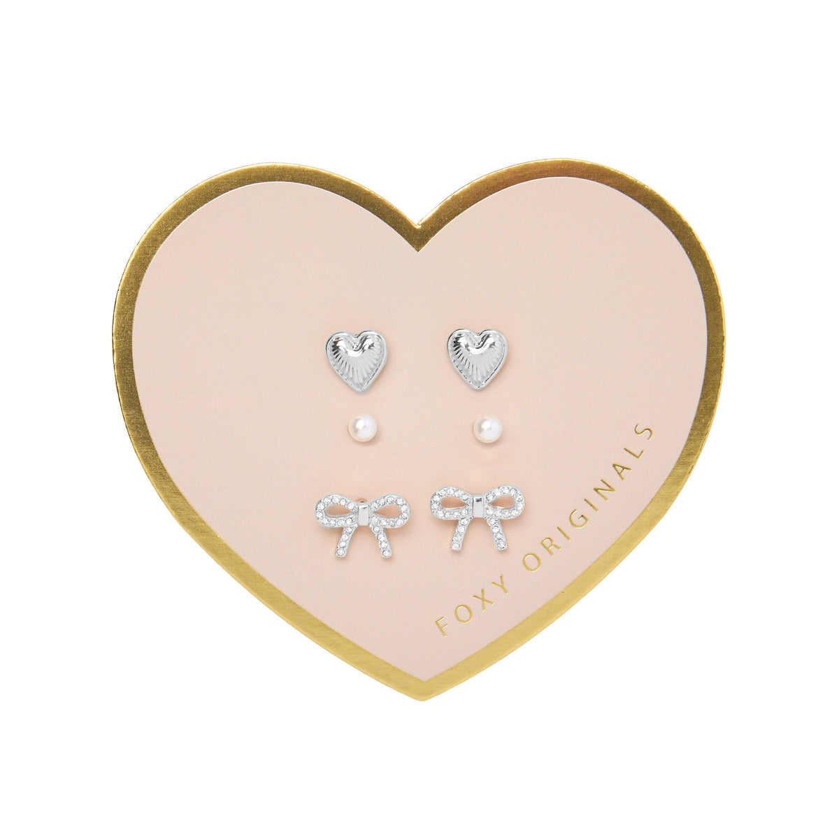 Bella Mix & Match Earrings by Foxy Originals – silver heart, pearl, and pavé bow studs displayed on heart-shaped card packaging