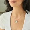 Foxy Originals Jewelry Bow Necklace available at Lemonberry Boutique Aurora