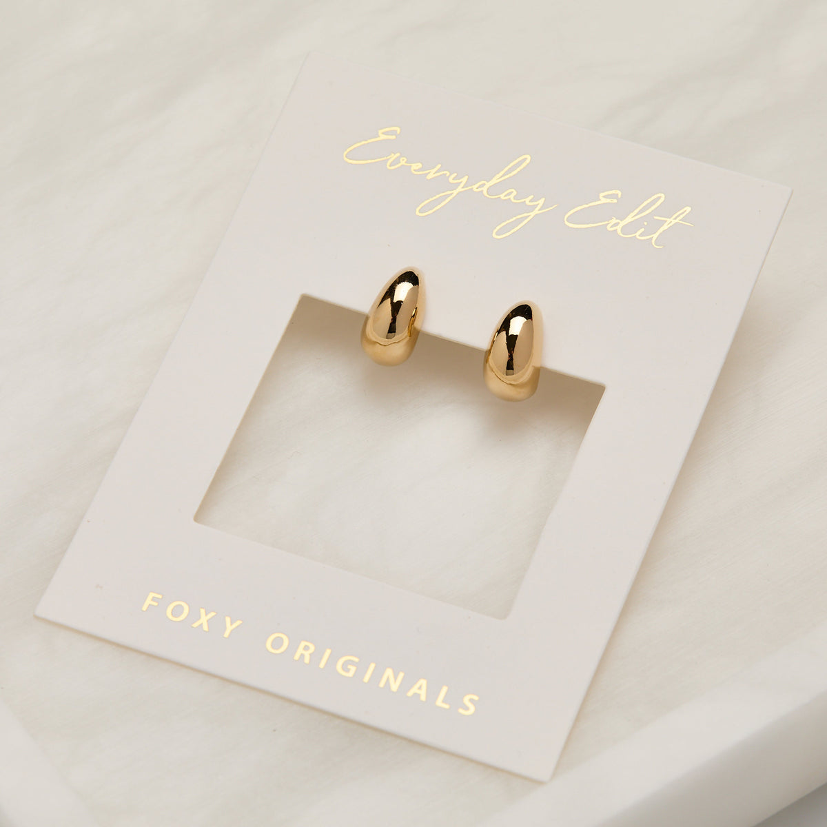 Foxy Originals Teardrop Earrings in gold on display card