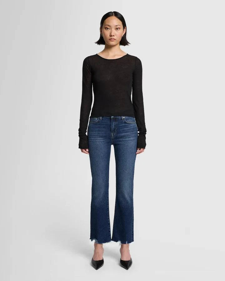 Full front view of model wearing Daisy Ankle Boot by 7 For All Mankind.