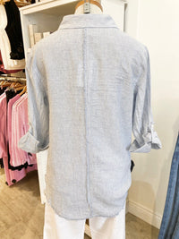  Back view of Garcia Shirt by Melissa Nepton on mannequin with white linen pants, Lemonberry boutique Aurora, ON