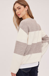 Back view of the Gentle Fawn Annalise sweater in Latte Stripe showing its oversized fit and wide stripes