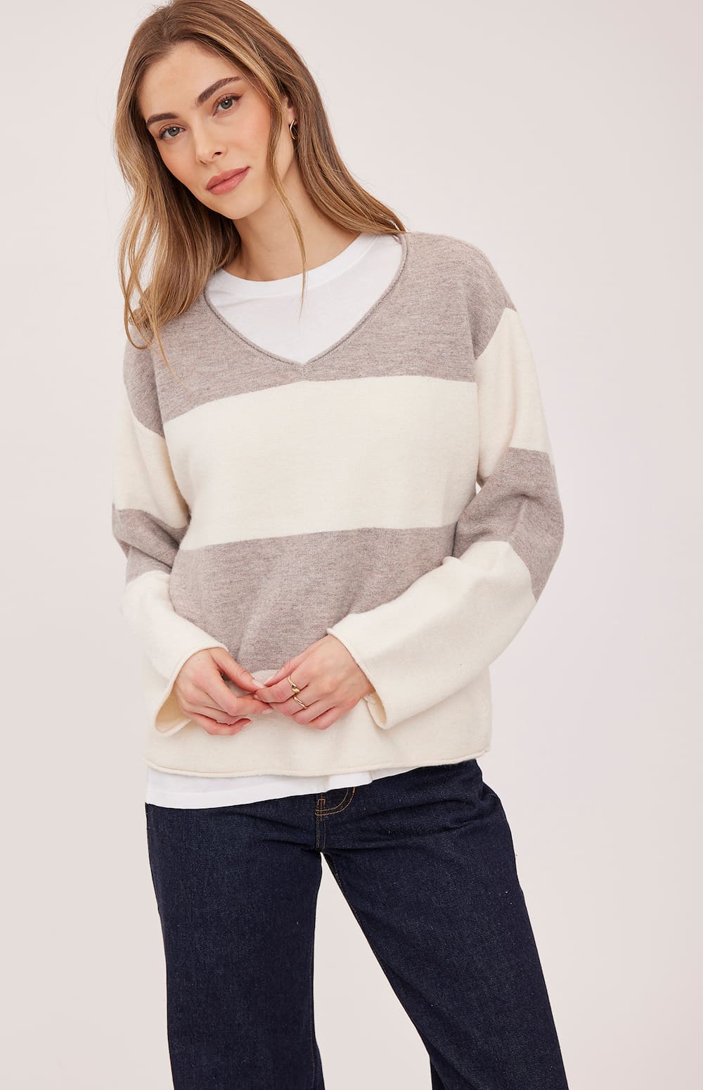 Front detail of the Gentle Fawn Annalise sweater in Latte Stripe showing its soft colour-block knit
