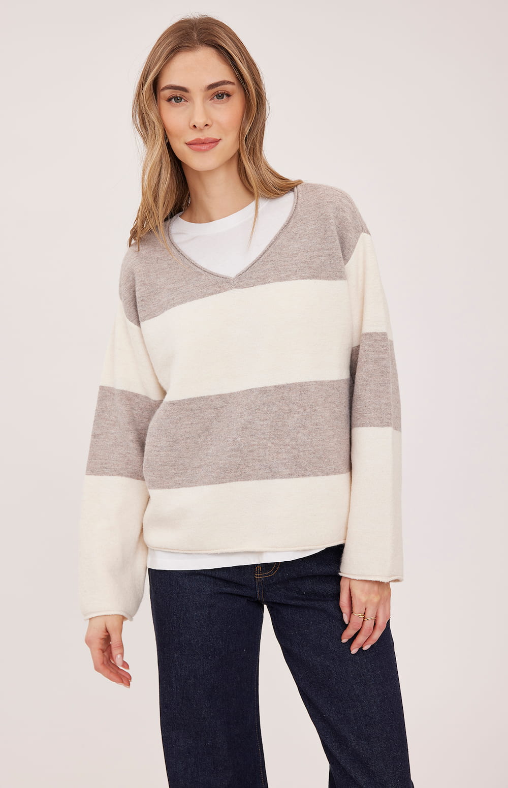 Front view of the Gentle Fawn Annalise sweater in Latte Stripe showing its relaxed fit and V-neck