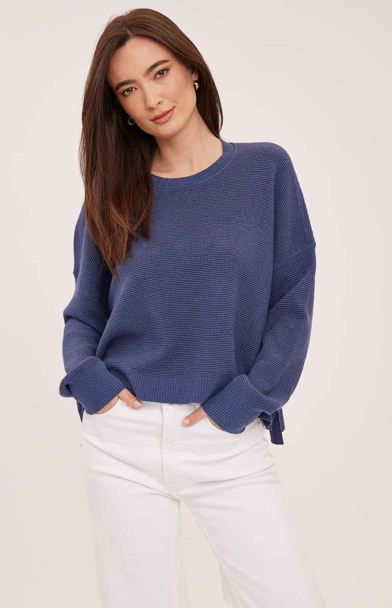 Front view of the Gentle Fawn Axel sweater in Heather Navy showing its relaxed oversized fit