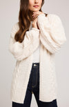 Gentle Fawn Betty Cardigan in cream, soft fuzzy yarn texture and mixed cable patterns visible.