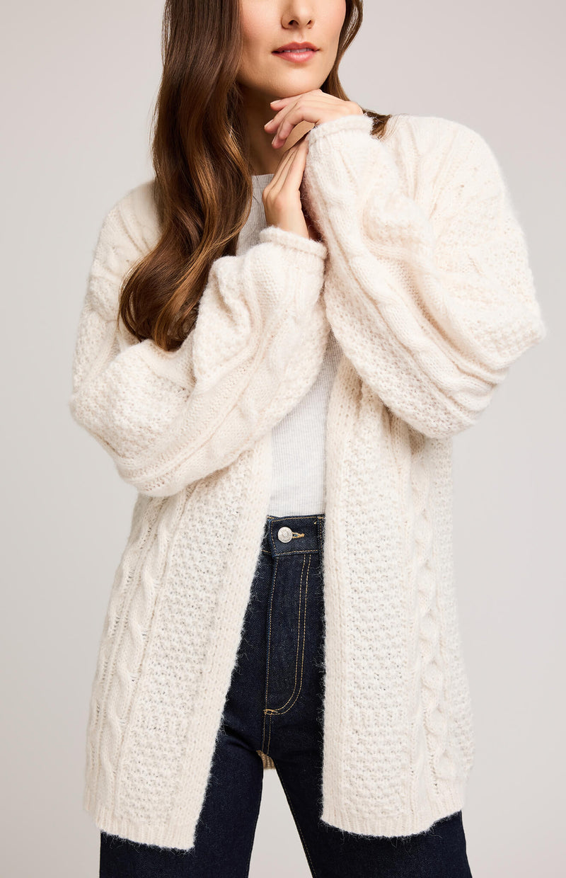 Gentle Fawn Betty Cardigan in cream, soft fuzzy yarn texture and mixed cable patterns visible.