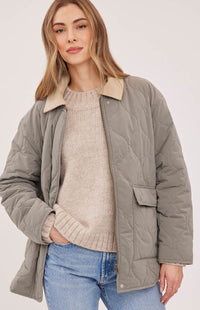 Open front view of the Gentle Fawn Felix jacket in Mineral showing its quilted finish and corduroy collar