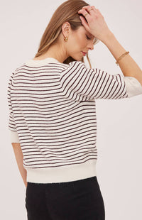 Back view of the Gentle Fawn Hildi cardigan in Fig Stripe showing the fine striped knit