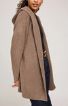 Side profile of Ilana cardigan by Gentle Fawn, featuring soft half-cardigan stitch and ribbed hem, photographed in Aurora at Lemonberry.