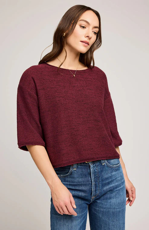 Woman wearing burgundy Kerrigan sweater with rolled hems and relaxed fit, styled with jeans on neutral background – Gentle Fawn available at Lemonberry in Aurora.