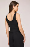 Back view of the Gentle Fawn Layla Tank in black. Shows full smocked texture and cropped cut with a subtle ruffle hemline.
