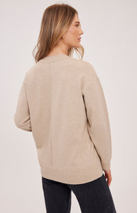 Back view of Gentle Fawn Louella knit sweater in soft heather oat