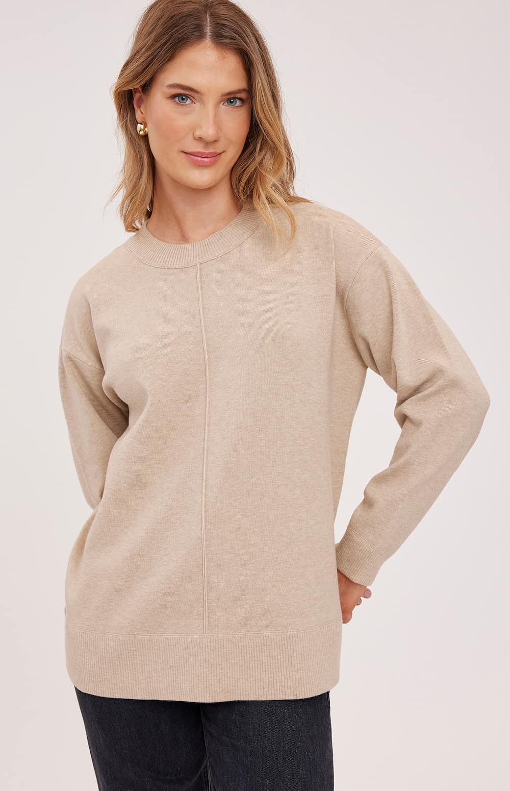 Close-up of Gentle Fawn Louella sweater showing centre seam and ribbed trim