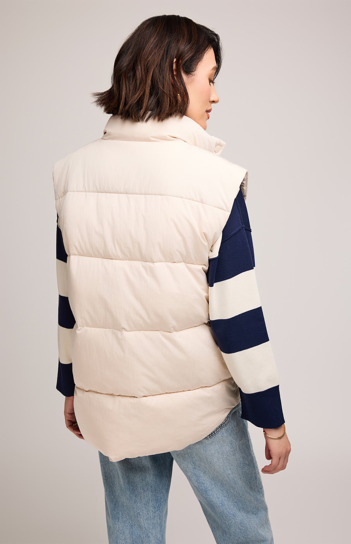 Back view of Gentle Fawn Nora Vest in cream, quilted nylon blend design.