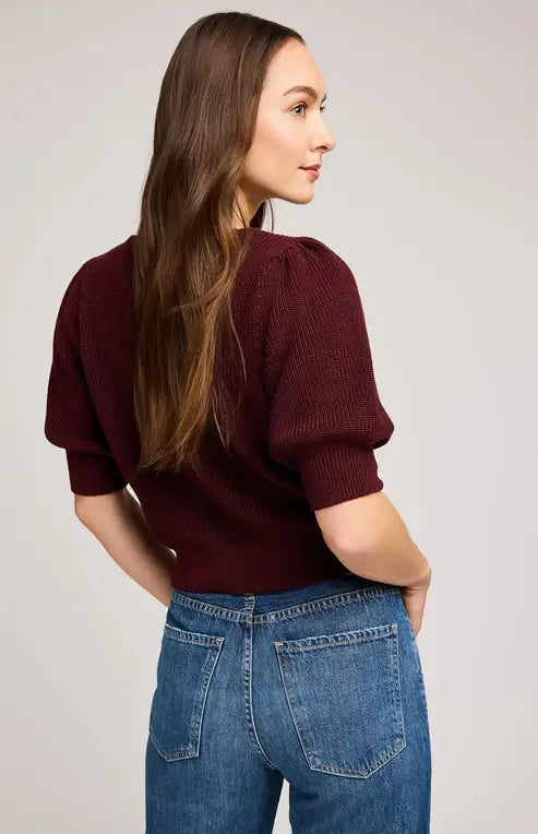 Back view of burgundy Phoebe sweater showing slim fit and puff-sleeve detail