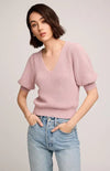 Model wearing light pink Phoebe sweater by Gentle Fawn with light denim – front view

