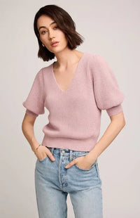 Model wearing light pink Phoebe sweater by Gentle Fawn with light denim – front view

