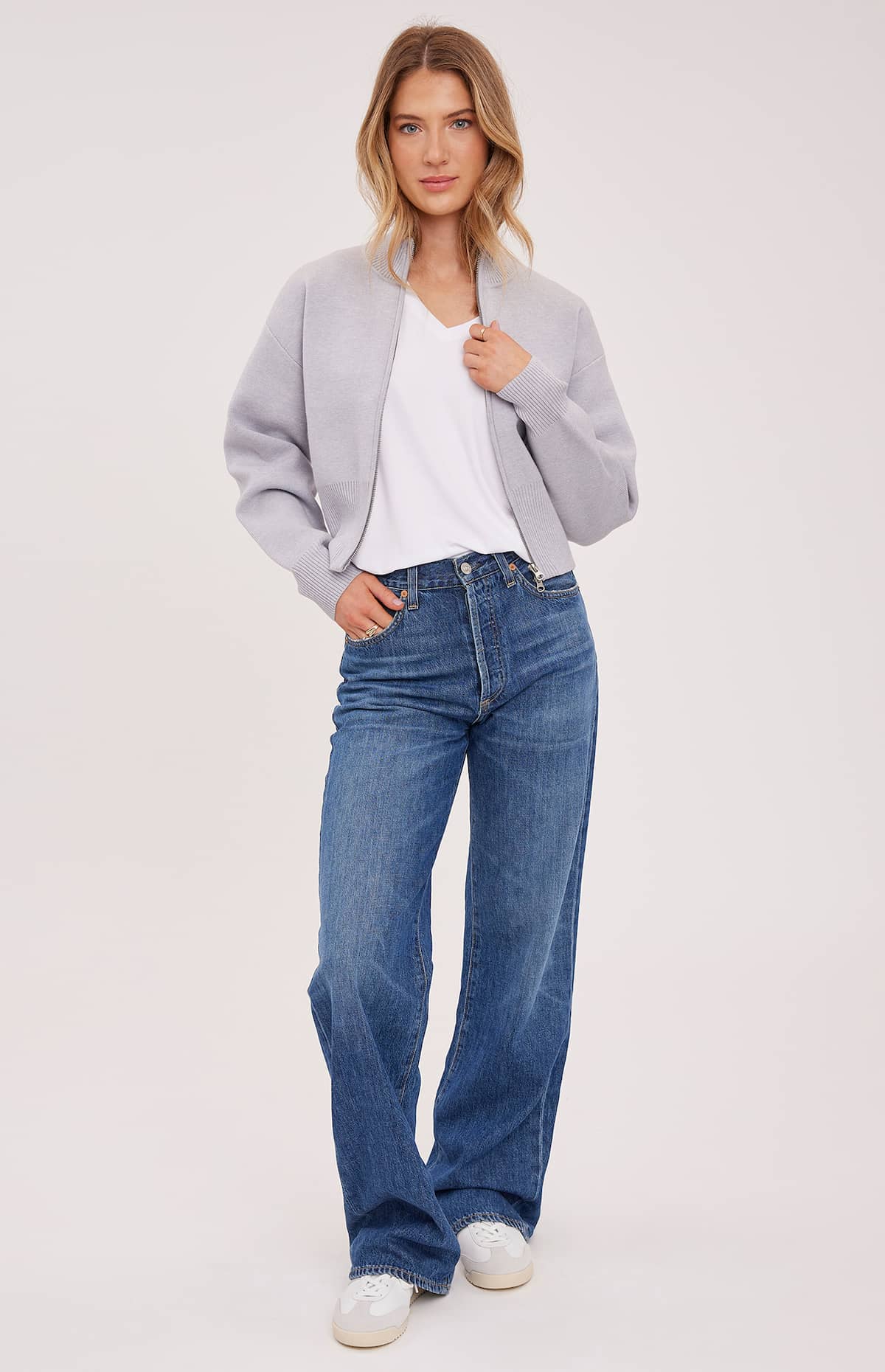 Model wearing Gentle Fawn Rowan Jacket in Heather Grey, front view, styled with jeans and white tee – Lemonberry Aurora.