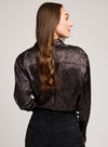 Back view of Gentle Fawn Simone Blouse showing soft satin drape and print detail.