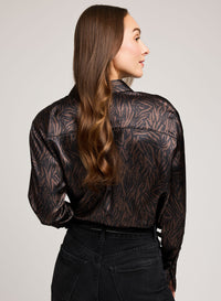 Back view of Gentle Fawn Simone Blouse showing soft satin drape and print detail.