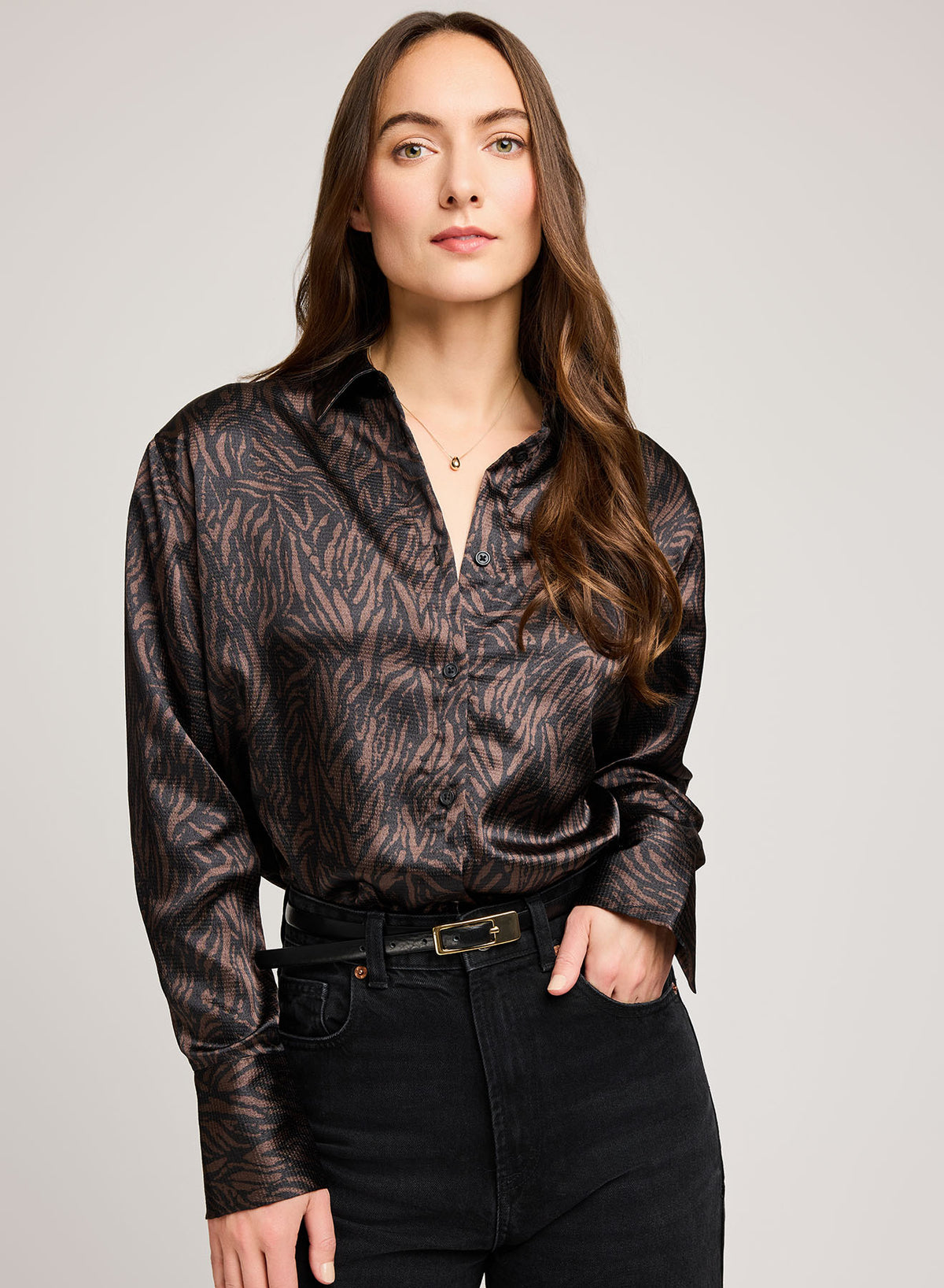 Model wearing Gentle Fawn Simone Blouse in Java Print – styled with black jeans, shot indoors.