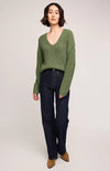 Front view of Gentle Fawn Spencer Sweater in olive green with V-neck and relaxed fit—styled with jeans at Lemonberry.