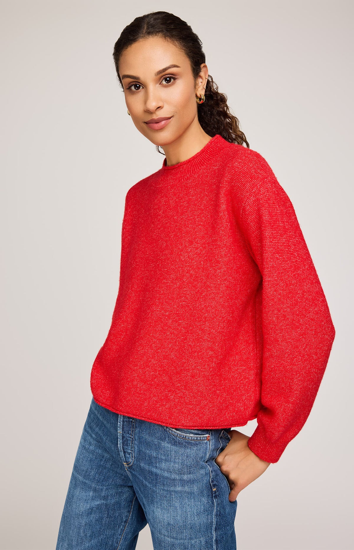 Gentle Fawn Wanda Sweater in heather red, side angle showing rolled neckline – available online at Lemonberry