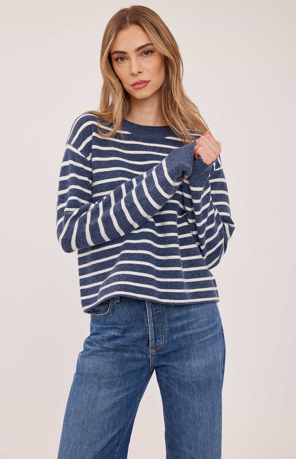 Front view of the Gentle Fawn Wanda sweater in navy stripe showing its relaxed fit