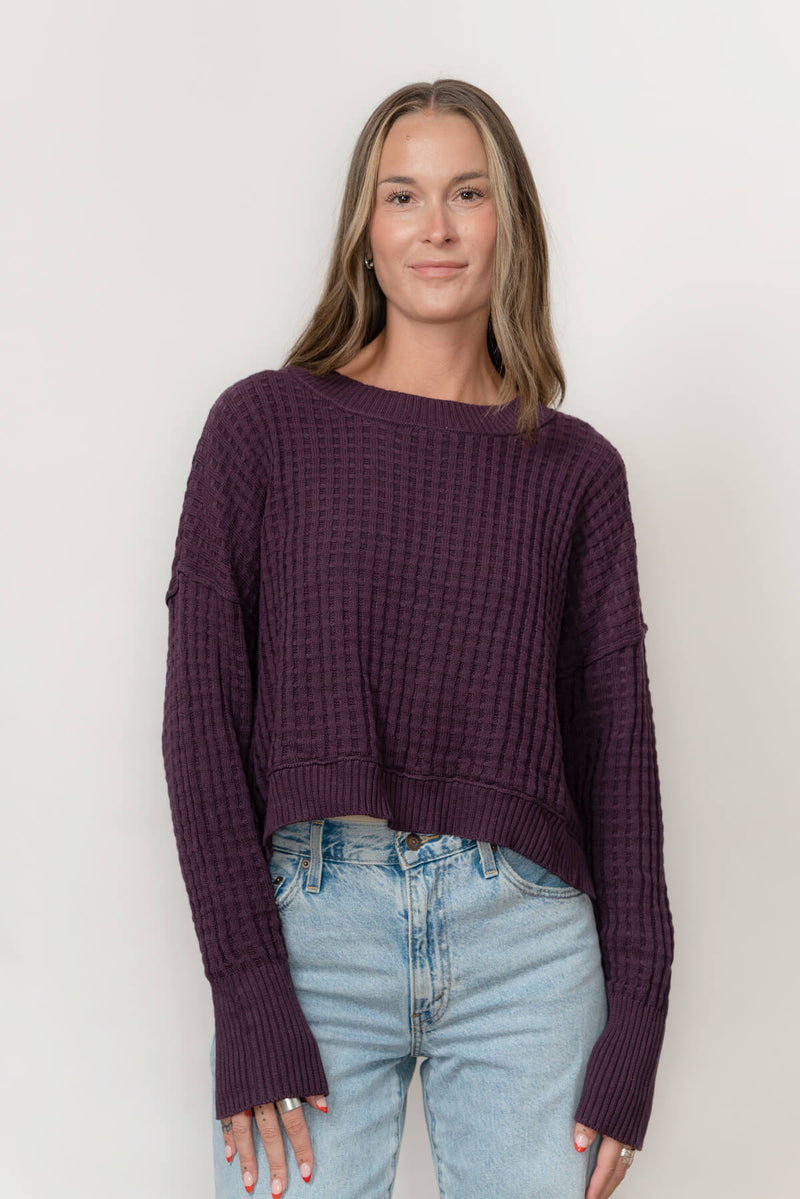 Front view of Echo Verde Sailing Sweater in Dusted Plum, waffle knit with fold-back cuffs, relaxed fit—Innisfil Friday Harbour reference.